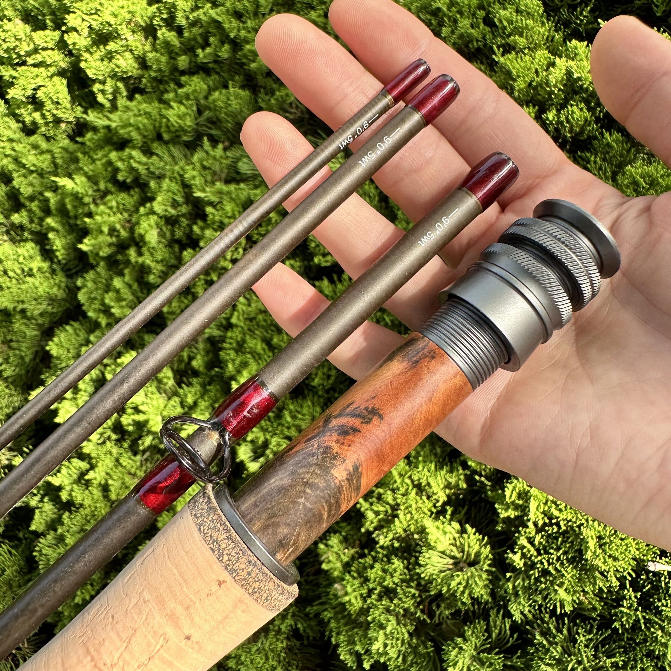 Angler casting with a carbon fiber fly rod